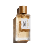 Ingenious Ginger perfume bottle with wooden cap and clear glass design